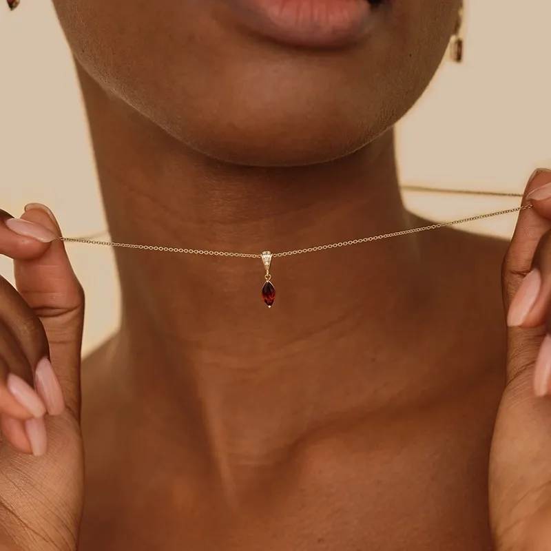 14 carat gold necklace with red garnet